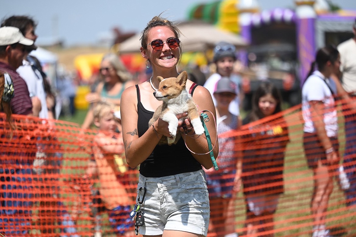 Sydney Brander and her cute Corgi, Peaches, are ready to run at the Good Old Days dog races. (Christa Umphrey photo)