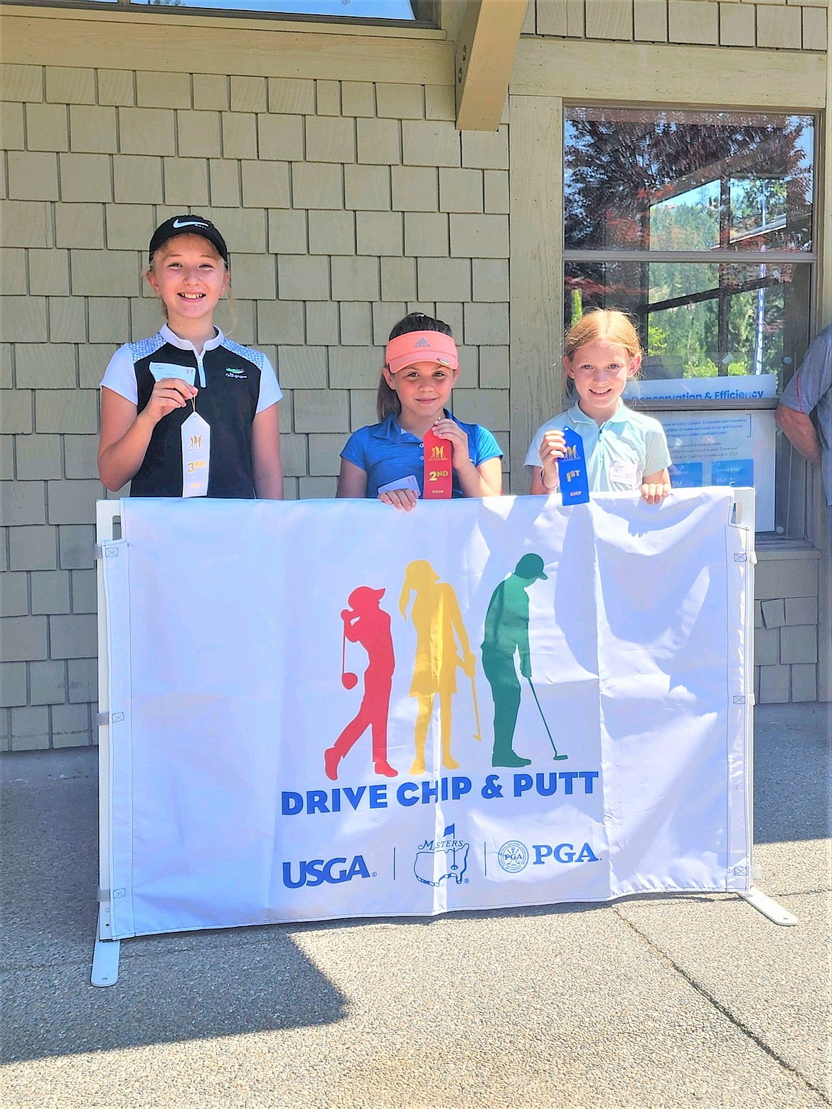 (center) Bonners Ferry local Gabriella Curreri, finished second at the local Drive, Chip and Putt in Spokane.