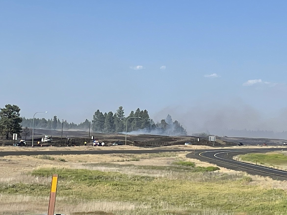 A wildfire near Fishtrap, on I-90 west of Spokane, triggered evacuation notices and burned 520 acres Monday afternoon.