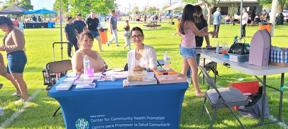 Representatives from Fred Hutch Cancer Center will be at the health fair Friday being held as part of the summer movie series in Mattawa. The cancer center was at the June movie night, pictured.