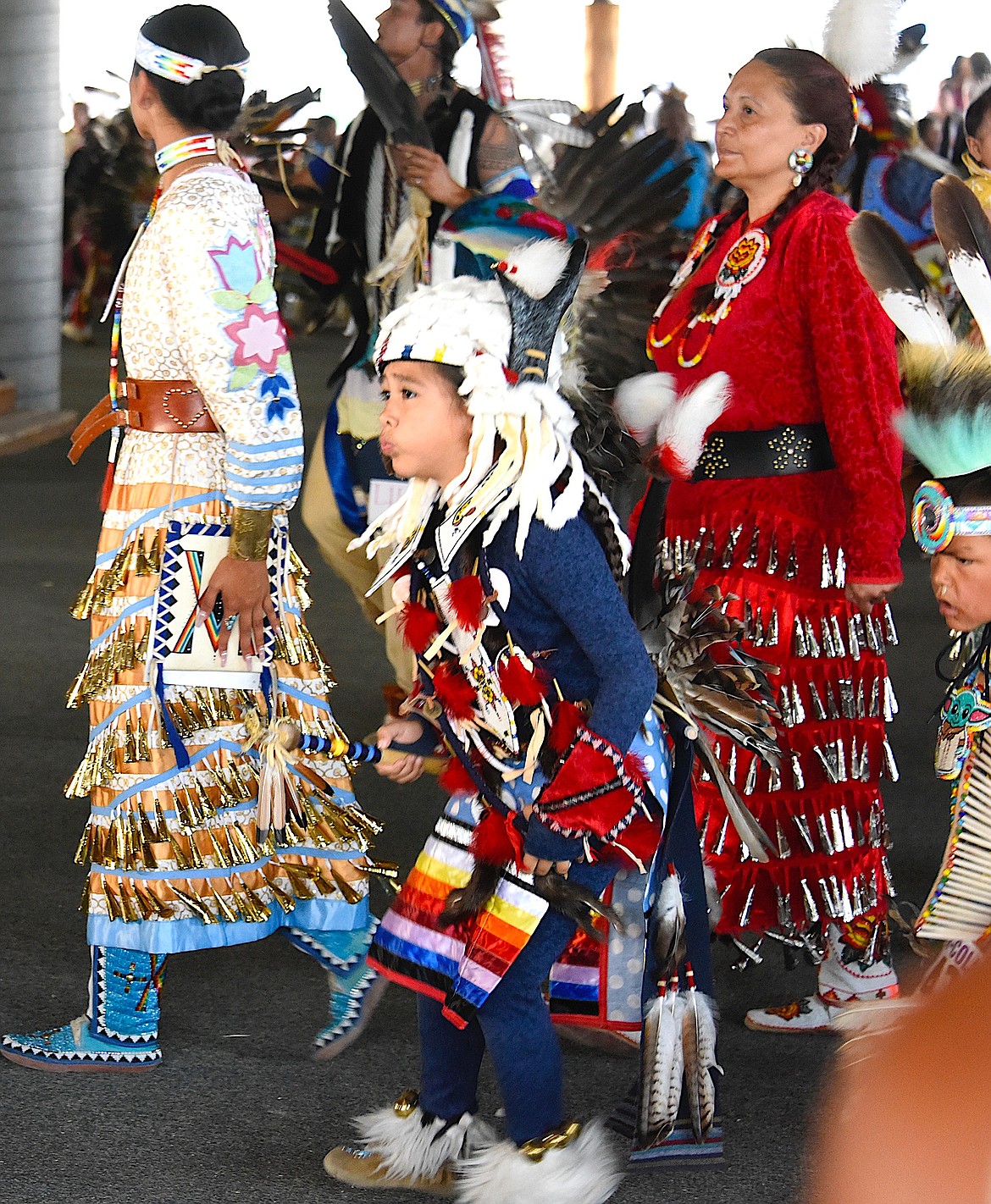 With $50,000 in prize money for dance contests, the dance floor was full at the Standing Arrow Powwow, including young dancers. (Berl Tiskus/Leader)