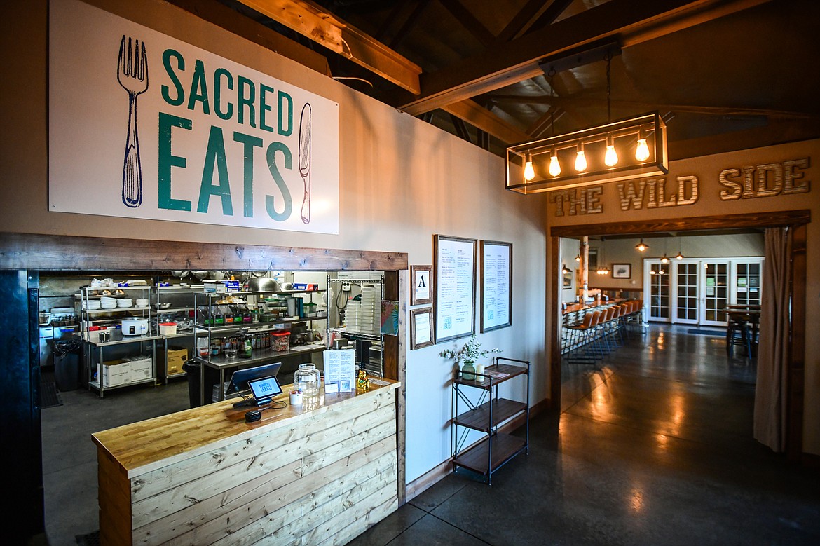 The expanded kitchen, left, and event space, right, at Sacred Eats inside Sacred Waters Brewing Company in Evergreen on Wednesday, July 19. (Casey Kreider/Daily Inter Lake)