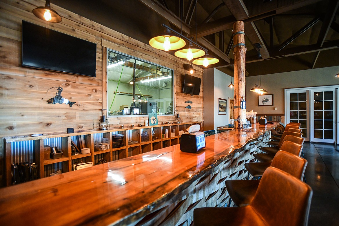 A bar and additional seating inside an expanded event space at Sacred Eats inside Sacred Waters Brewing Company on Wednesday, July 19. (Casey Kreider/Daily Inter Lake)