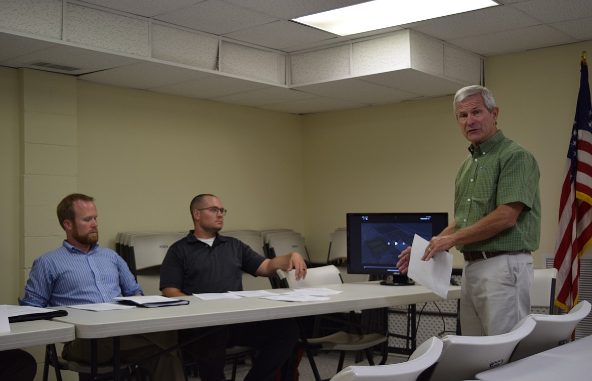 Quincy City Administrator Pat Haley, right, talks about the proposed Q-Plex project during the George City Council meeting Tuesday. The proposed park district would include both George and Quincy.