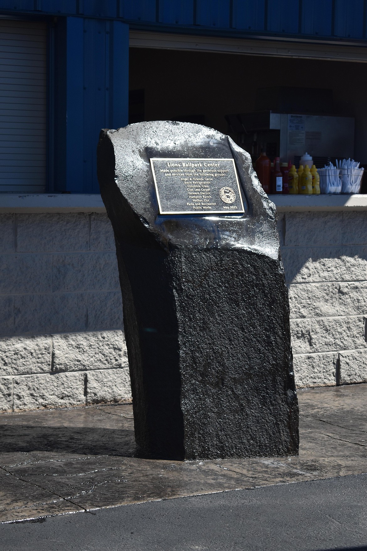 A plaque was placed in front of the concession stand, dedicated to individuals and donors for the renovation of Lions Park.