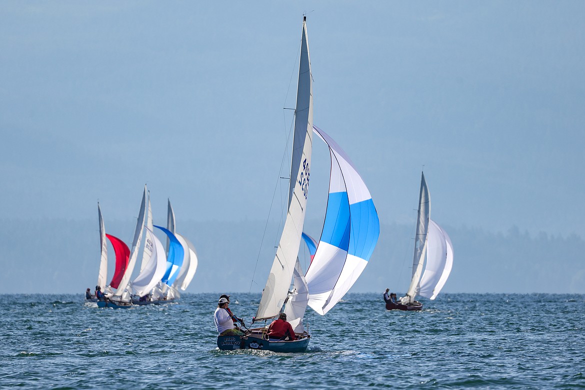 A thistle crew sails downwind in the 77th Thistle Nationals on Wednesday, July 19 on Flathead Lake. (JP Edge/Hungry Horse News)