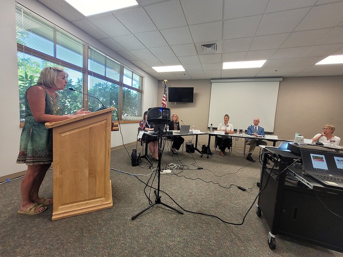 Rebecca Priano of Post Falls addresses Community Library Network trustees Thursday afternoon during a regular meeting of the board at the Post Falls Library.