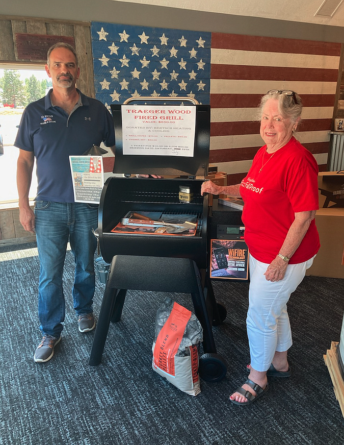 Joel Bertsch of Bertsch Heating and Cooling donated a Traeger wood-fired grill and accessories valued at $800 to the Hayden Senior Center for the senior center to give away in a July 29 drawing. Bertsch is pictured here with Hayden Senior Center board treasurer Kathy Verburg. Drawing tickets to win the grill are one for $10 or six for $50. The Hayden Senior Center Classic Car Cruise will also be July 29 from 11:30 a.m. to 12:30 p.m. and a $15-per-person lunch will be from 12:30 p.m. to 2 p.m. The Hayden Senior Center is at 1250 W. Lancaster Road, Hayden. Info: 208-762-7052