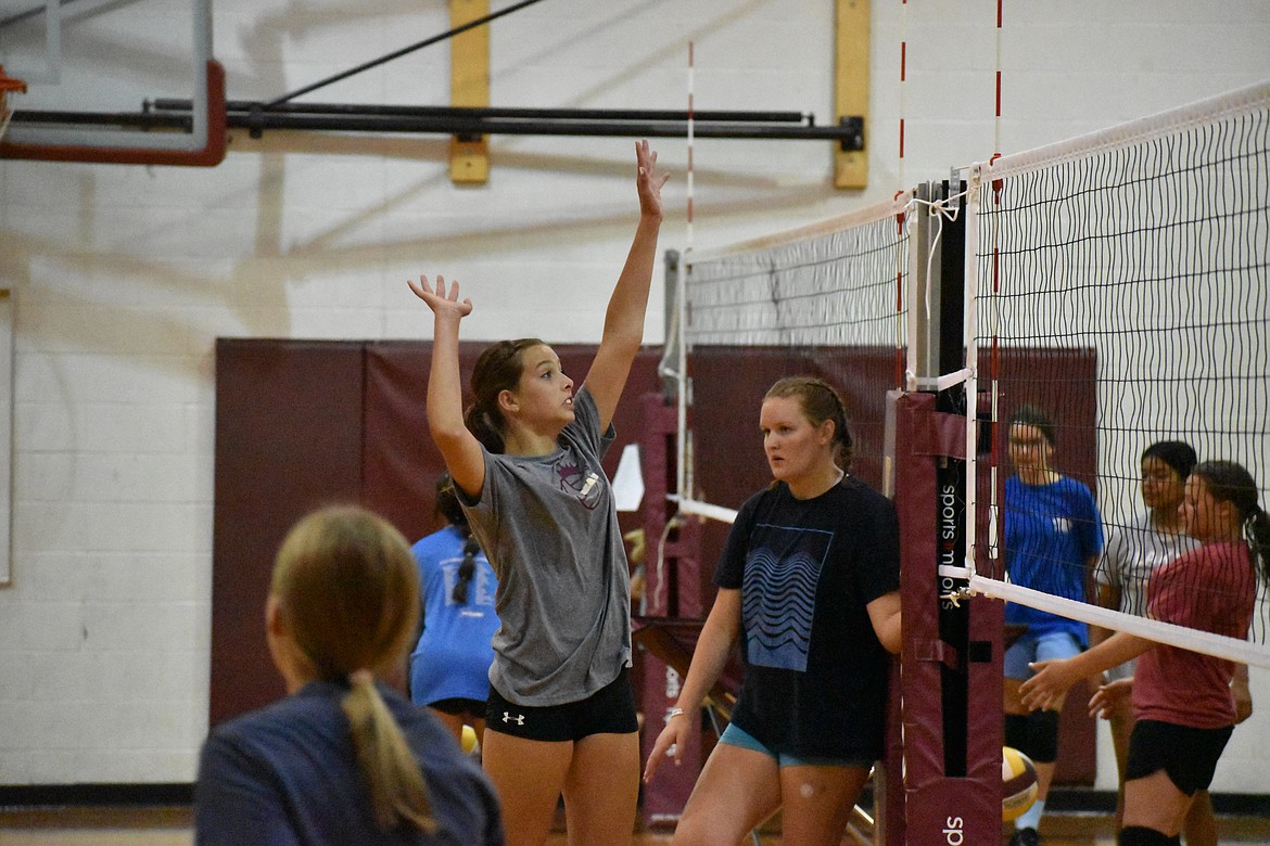 A camper at the Lil Mav volleyball camp rises for a spike during a drill. The camp is based on the typical flow of a practice session for the Moses Lake varsity team.