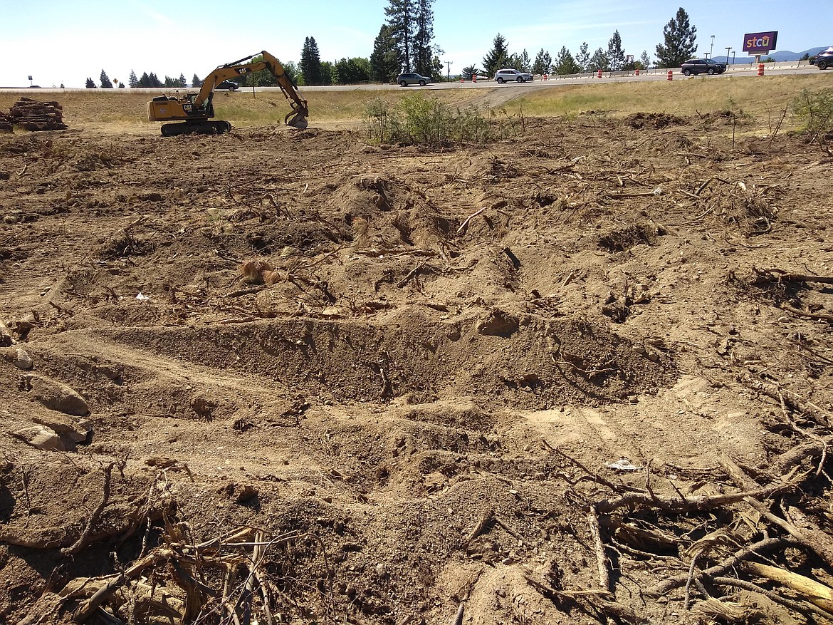 Trees and a large boulder have been removed from land near the Interstate 90 and Highway 41 interchange in Post Falls as highway construction continues. Post Falls resident Bruce Kauffman took this photo Tuesday.