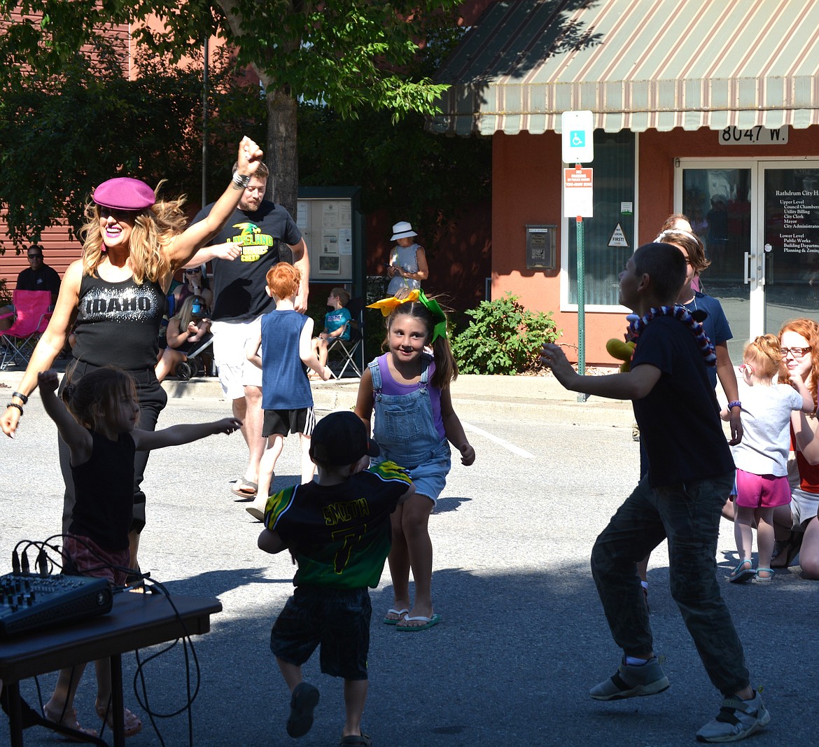 Sarah Polk got the dance party started at the top of the Rathdrum Days Parade Saturday morning. (CAROLYN BOSTICK/Press)