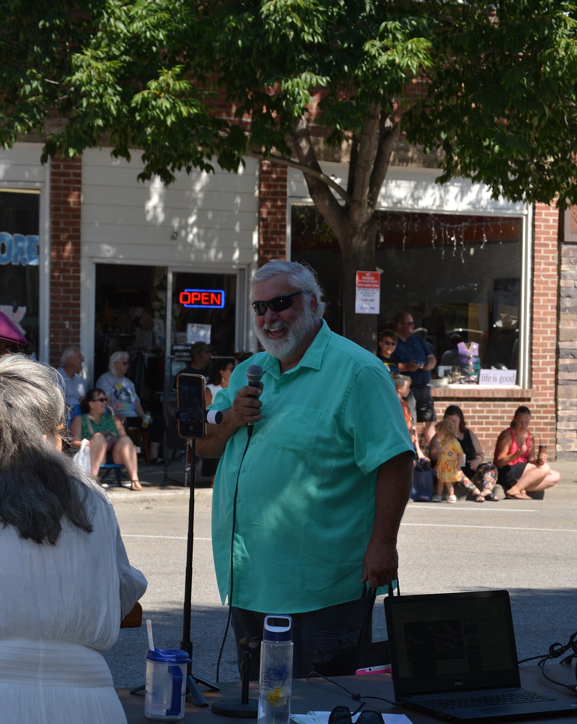 Mayor Vic Holmes takes a break form throwing candy to speak to the crowd during the Rathdrum Days Parade. (CAROLYN BOSTICK/Press)