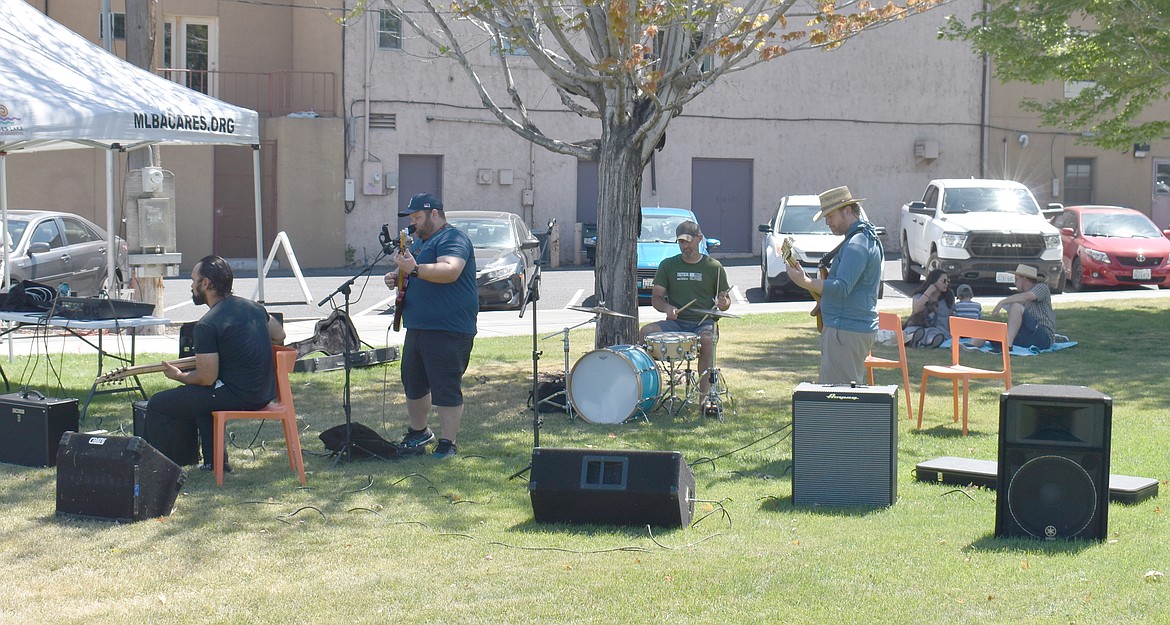 The Pangoliers play bluesy rock music at the open mic at the Neppel Family Picnic Saturday.