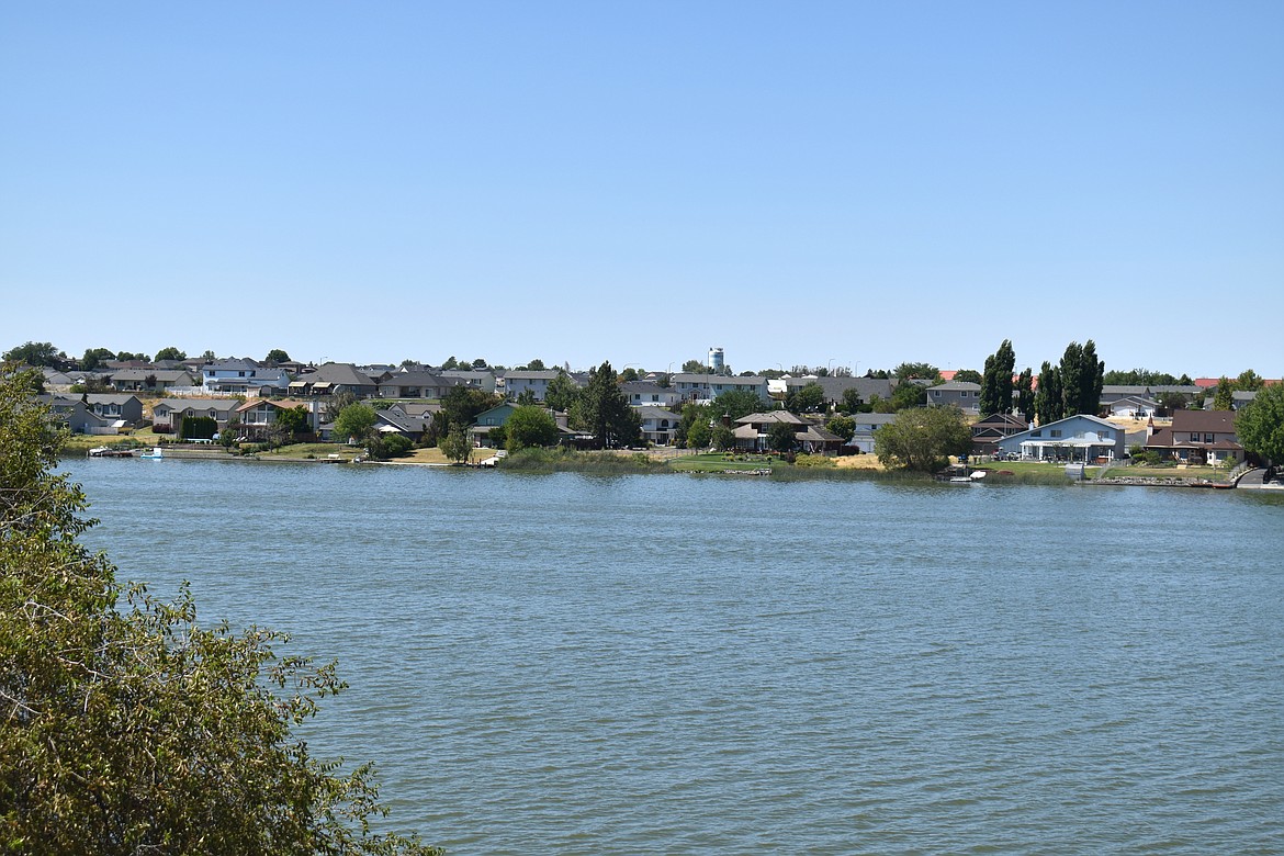 The blue surface of Moses Lake gives a cool accent to a bright, 96-degree Saturday afternoon.