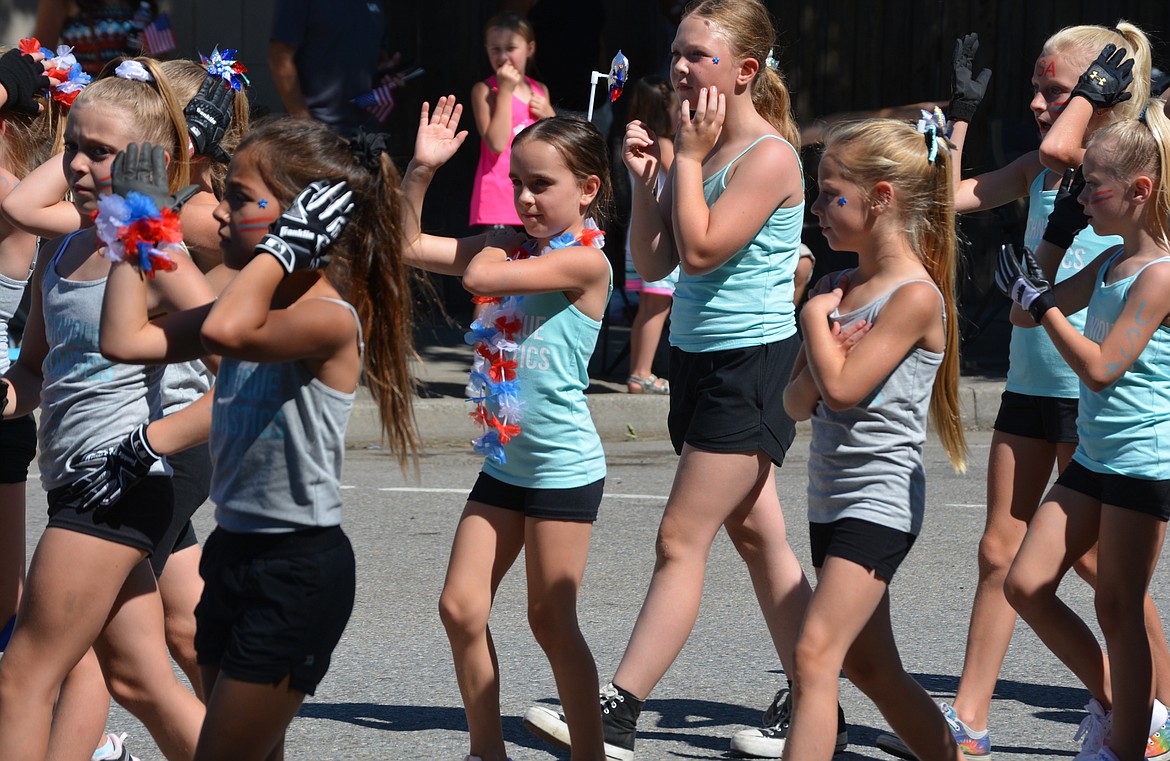 Students from Technique Gymnastics get in formation during the Rathdrum Days Parade on Main Street.