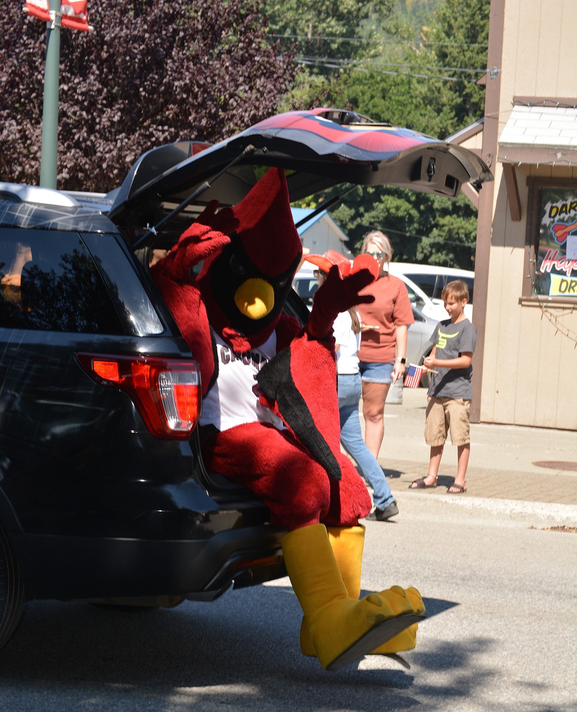 Cecil, NIC's cardinal mascot makes an appearance at the Rathdrum Days Parade on Main Street.