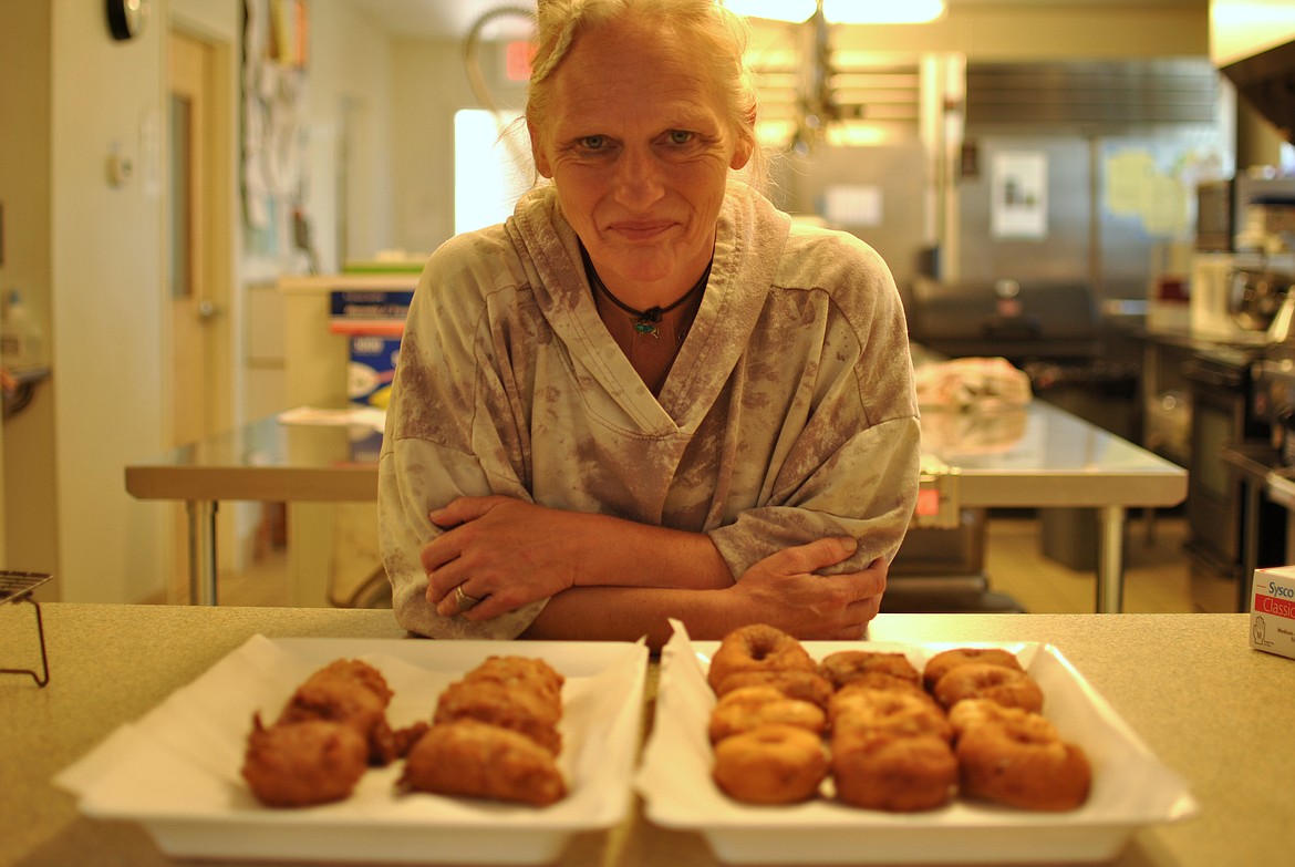 Made with love and sprinkled with cinnamon sugar, Johanna Stuarts hand made donuts are served inside the St. Regis Senior Center four days a week for locals and passerby's to enjoy. (Mineral Independent/Amy Quinlivan)