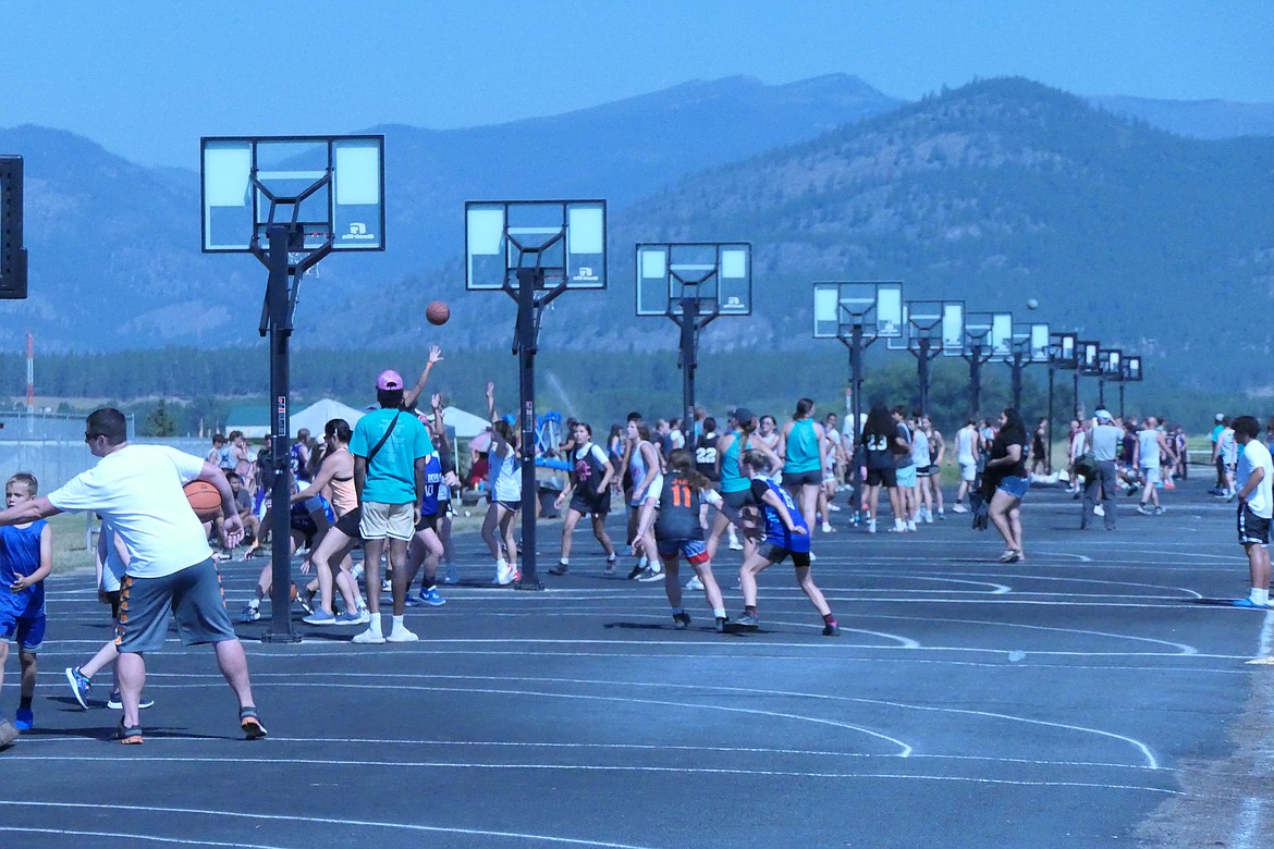 A look down the row of 17 half court basketball courts set up for the 2023 Wild Horse Shoot Out 3-on-3 basketball tournament in Plains Saturday. (Chuck Bandel/VP-MI)