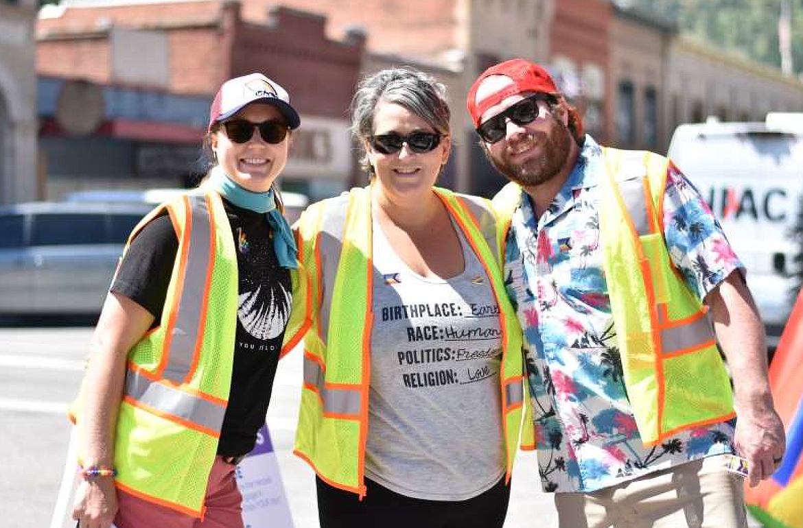 A few members of the volunteer and security team stop for a smile during Silver Valley Pride 2023.