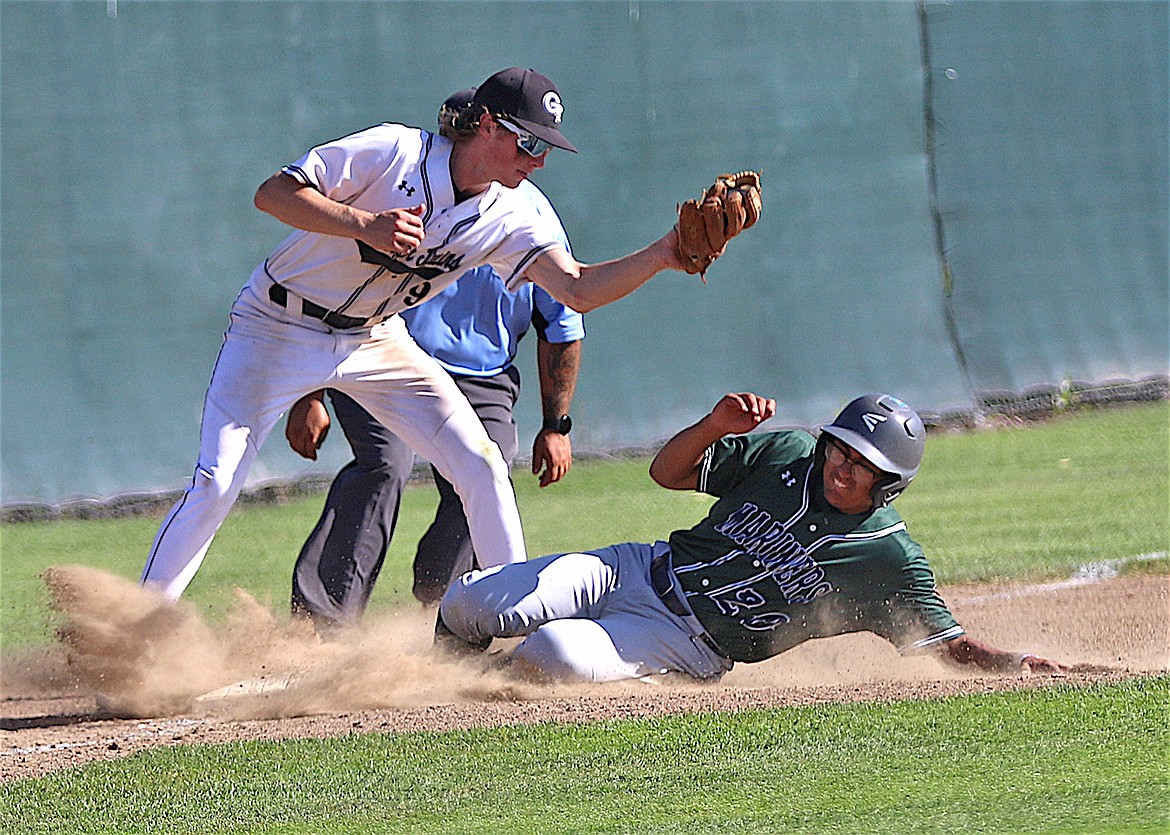 Mission Valley Mariner Zak Muzquiz slides safely into third during Saturday's game against the Glacier Twins. (Bob Gunderson photo)