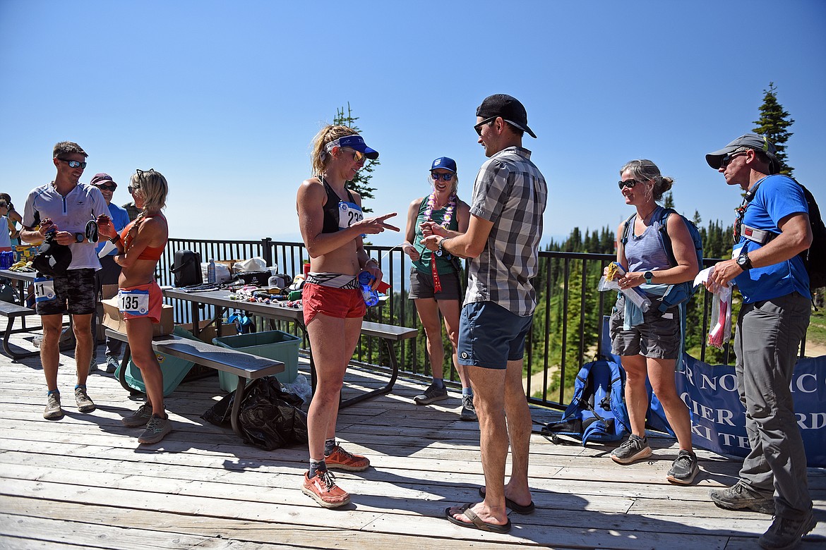 Second place finishers, Scarlet Kaplan and Drew Coco, play rock, paper, scissors before choosing their prizes. (Julie Engler/Whitefish Pilot)