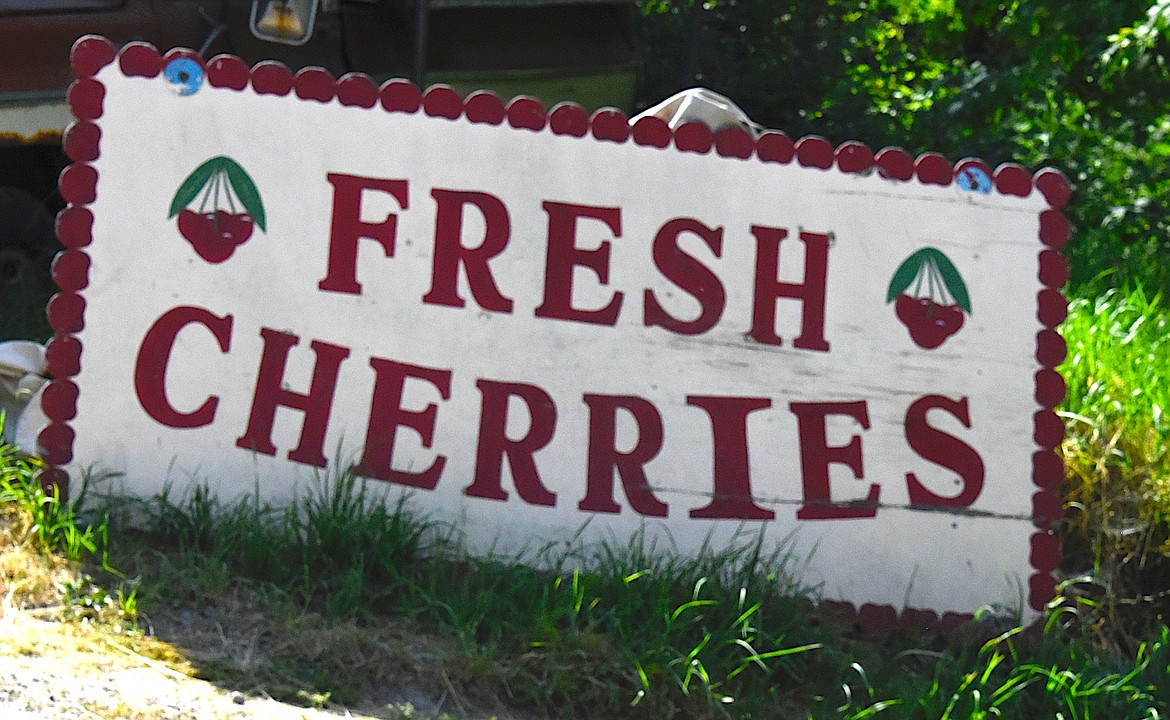 Fresh cherries is a sign that the iconic Flathead cherries are ripe. This sign leads to Gateway Orchard's cherry stand.