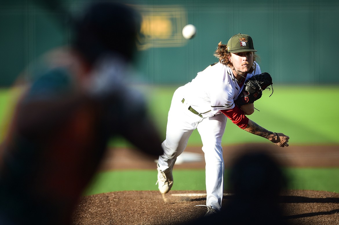 Glacier Range Riders starting pitcher Noah Barros (13) delivers in the first inning against the Missoula Paddleheads at Glacier Bank Park on Tuesday, July 25. (Casey Kreider/Daily Inter Lake)