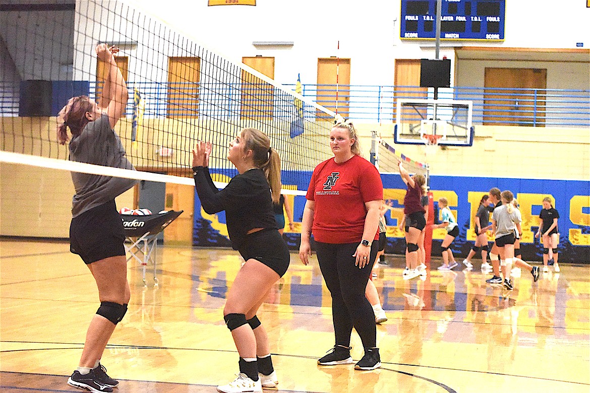 North Idaho College head volleyball coach Brittany Tilleman oversees a drill at a two-day camp at Libby High School last week. (Scott Shindledecker/The Western News)