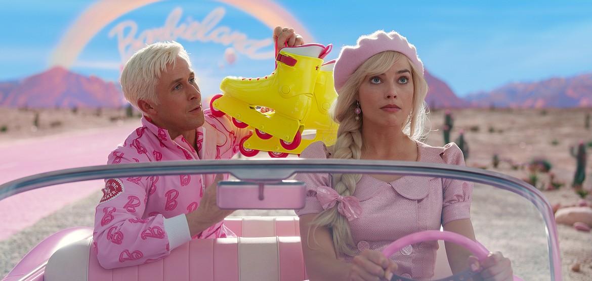 This image released by Warner Bros. Pictures shows Ryan Gosling and Margot Robbie in a scene from "Barbie."