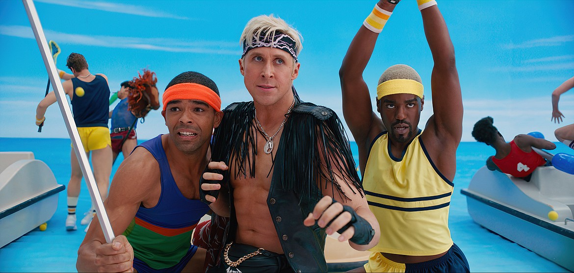 This image released by Warner Bros. Pictures shows Kingsley Ben-Adir, from left, Ryan Gosling and Ncuti Gatwa in a scene from "Barbie."