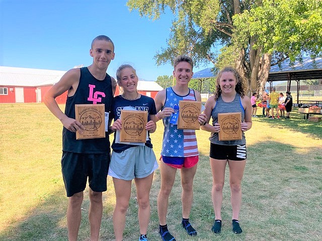 Kootenai River Run 5K and 10K winners (left) Connor Alexander, Camille Ussher, Alexander Fry and Abigail Gordon.