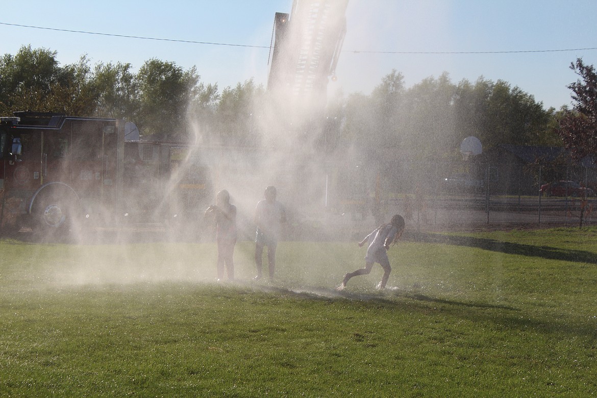 The fire hose set up by Grant County Fire District 8 proved popular on a hot summer afternoon in Mattawa’s Hund Memorial Park.