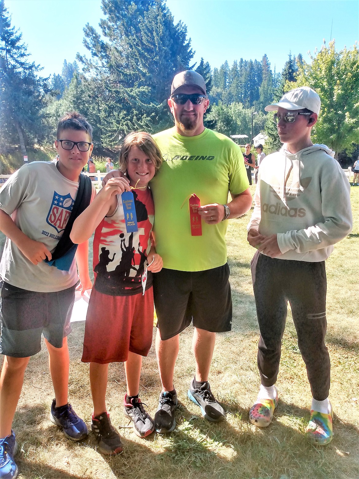 The Woelfle family shows off ribbons after the Kootenai River Run.