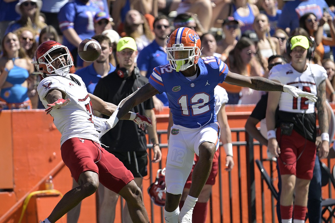 Eastern cornerback Marlon Jones Jr., in white, breaks up a pass during a game against Florida last season. Jones Jr. was one of four Eagles to be named to the Big Sky’s Preseason All-Conference Team.