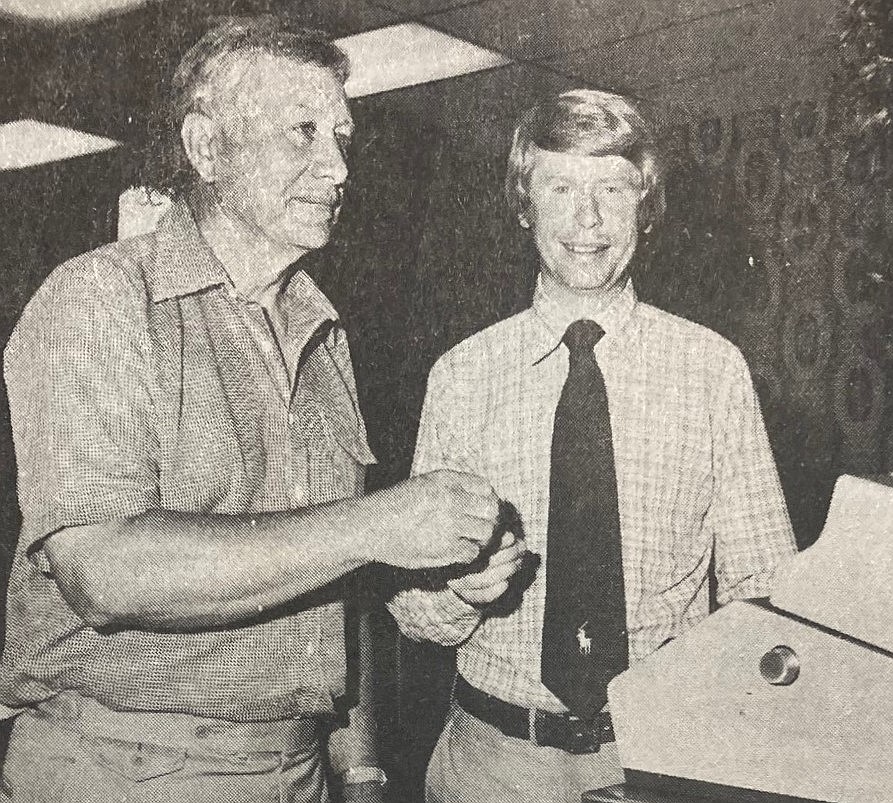 Charlie Nipp accepts keys to the first restaurant from Elmer Jordan.