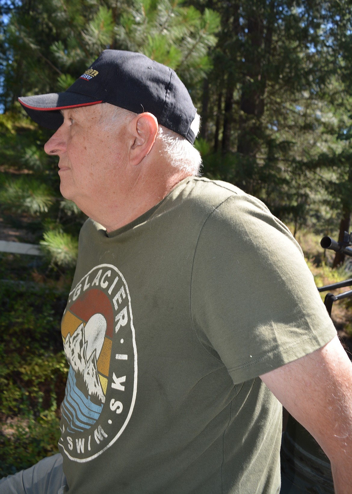 Jim Hossack rides on the top of a self-propelled gun on his property in Rathdrum. Jim and Julia Hossack fix up demilitarized vehicles and bring them as attractions to local parades. Their British FV433 Abbot 105 mm self-propelled gun was featured in the Rathdrum Days Parade. (CAROLYN BOSTICK/Press)