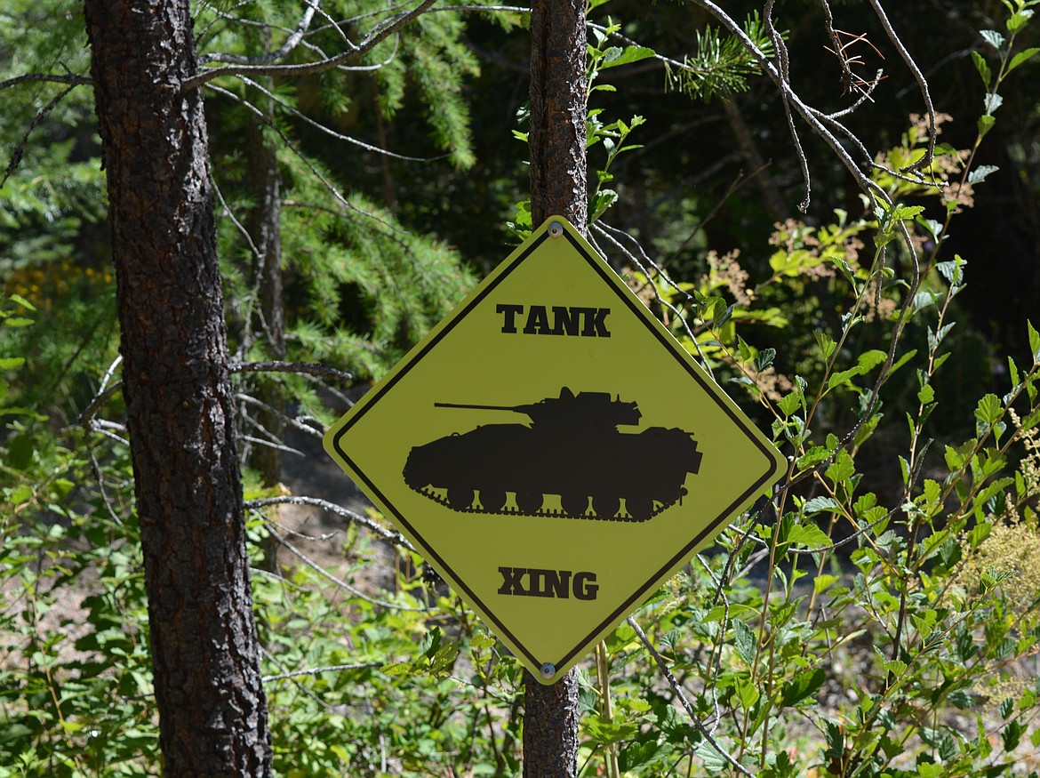 A "Tank Crossing" sign is posted on the Hossack property in Rathdrum. (CAROLYN BOSTICK/Press)