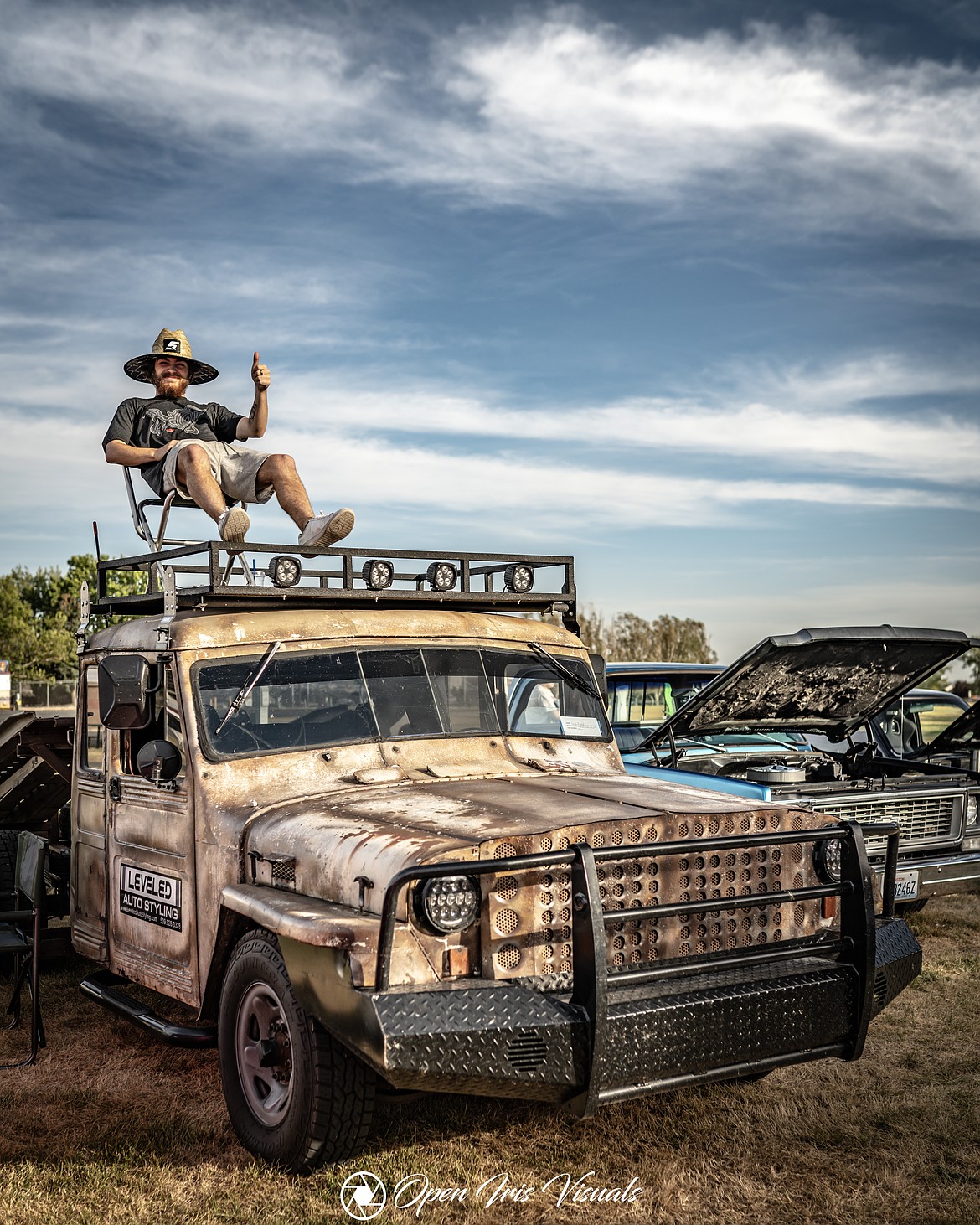 A truck owner shows off his ride from the roof at Basin Summer Showdown 2022. The 2023 car show will be Saturday in Ephrata.