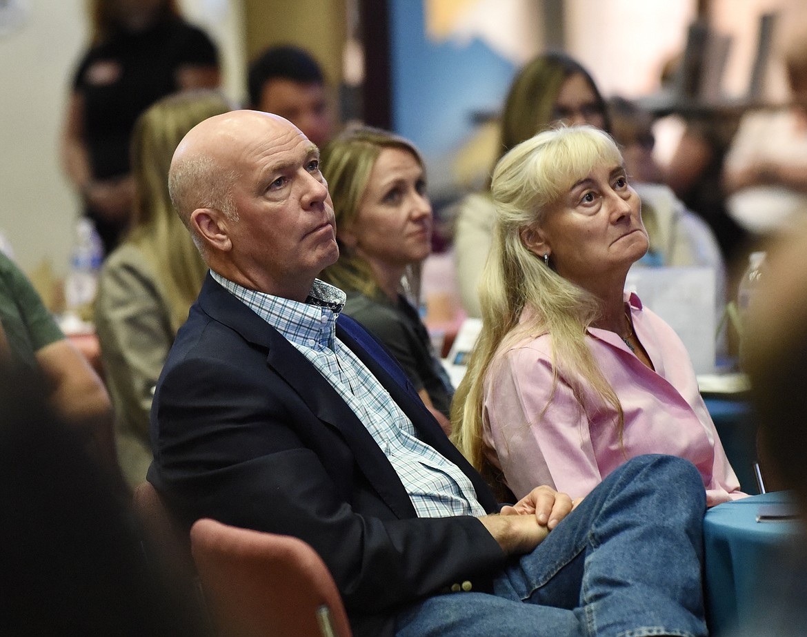 Montana Gov. Greg Gianforte, along with First Lady Susan Gianforte, listens to speakers Thursday during the Governors’ Cup kick-off luncheon at Flathead Valley Community College. (Heidi Desch/Daily Inter Lake)