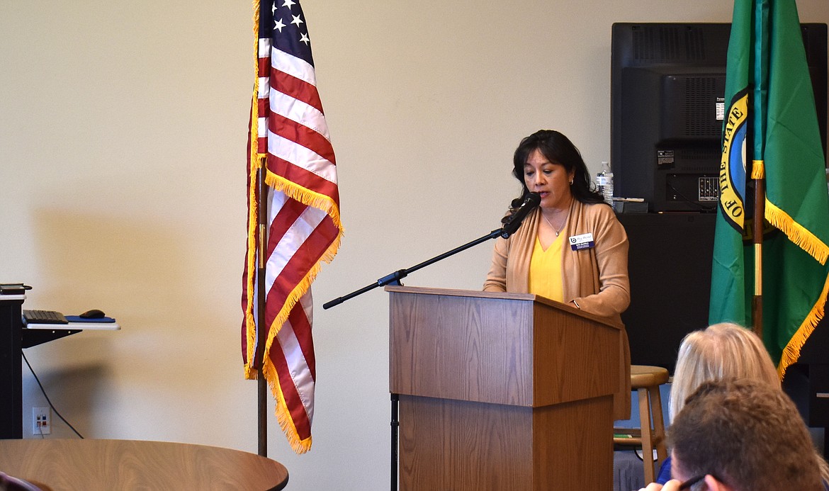 Julia Gamboa, Big Bend Community College program coordinator for workforce education, welcomes OIC of Washington to its new offices in the WorkSource Center in Moses Lake.