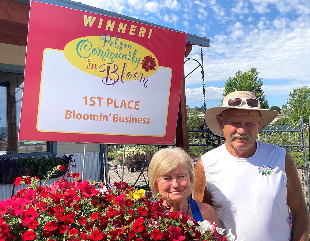 Twila and West Delaney of Delaney’s Landscape Center which won first place for in the business category for Polson in Bloom. (Jane Larson photo)