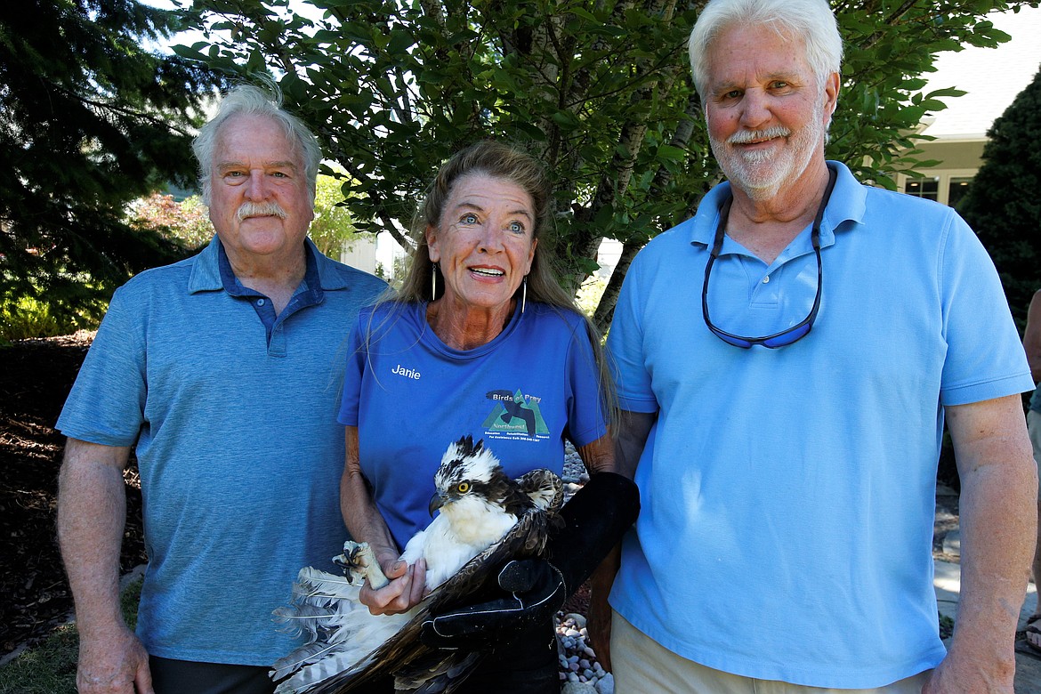 Jane Veltkamp is joined by Tom Hudson and Dave Noss before releasing an osprey on Wednesday.