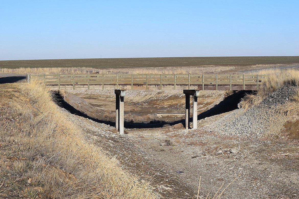 A wooden bridge over the East Low Canal north of Warden. While many of the canals in Eastern Washington are now filled with water from regional reservoirs, the Washington State Department of Ecology says there is still a drought in progress with a shortage of water overall in comparison to recent years.