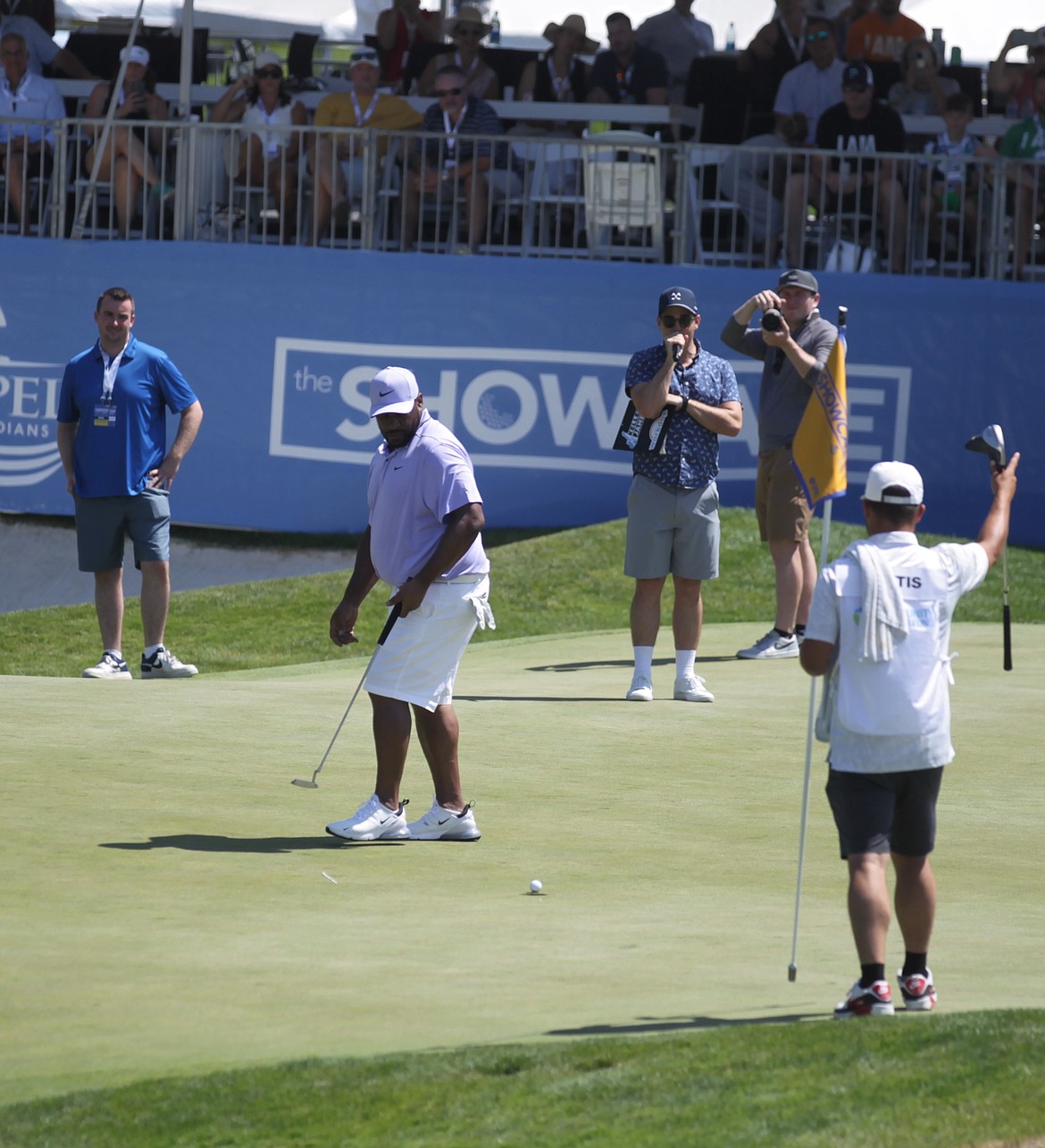 JASON ELLIOTT/Press
Former NFL running back Jerome Bettis putts in his final shot of the Showcase golf exhibition on Saturday at The Coeur d'Alene Resort Golf Course.