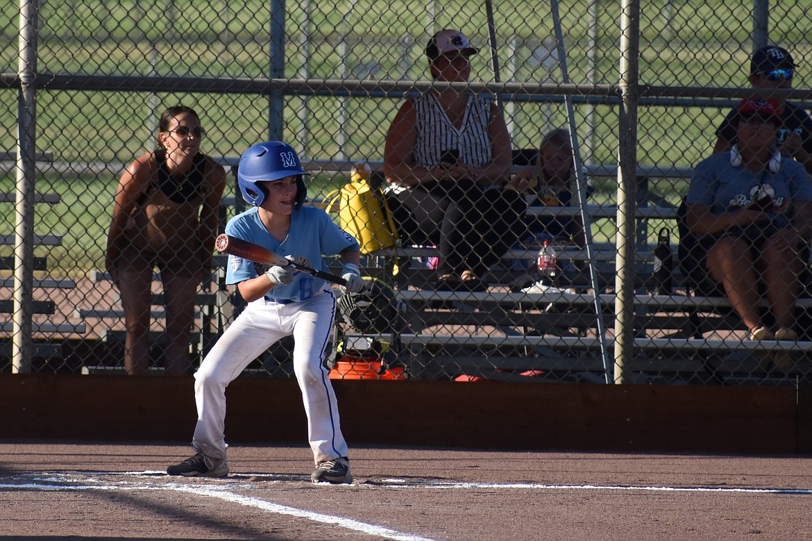 A player on the Magnolia All-Stars prepares to bunt against Mill Creek in the consolation bracket final on Friday in Othello