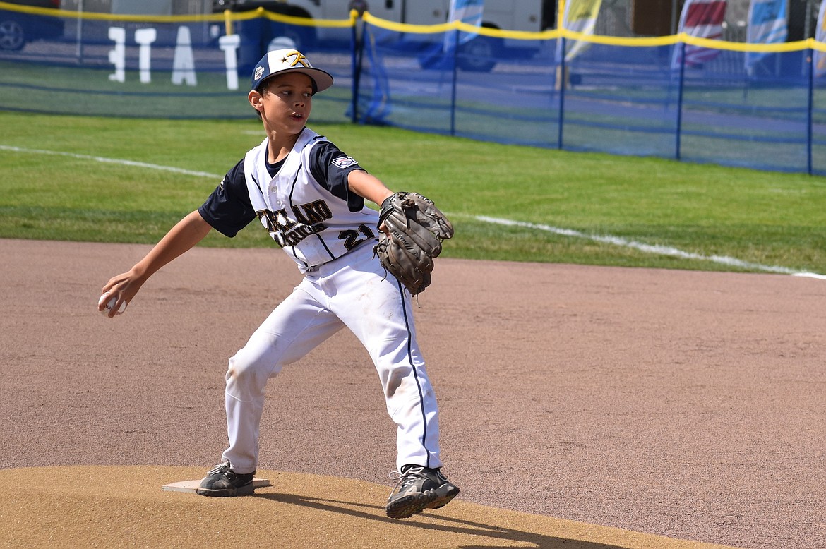 Kirkland American pitcher Cole Kinnee pitches against the Magnolia All-Stars in Saturday’s championship game.