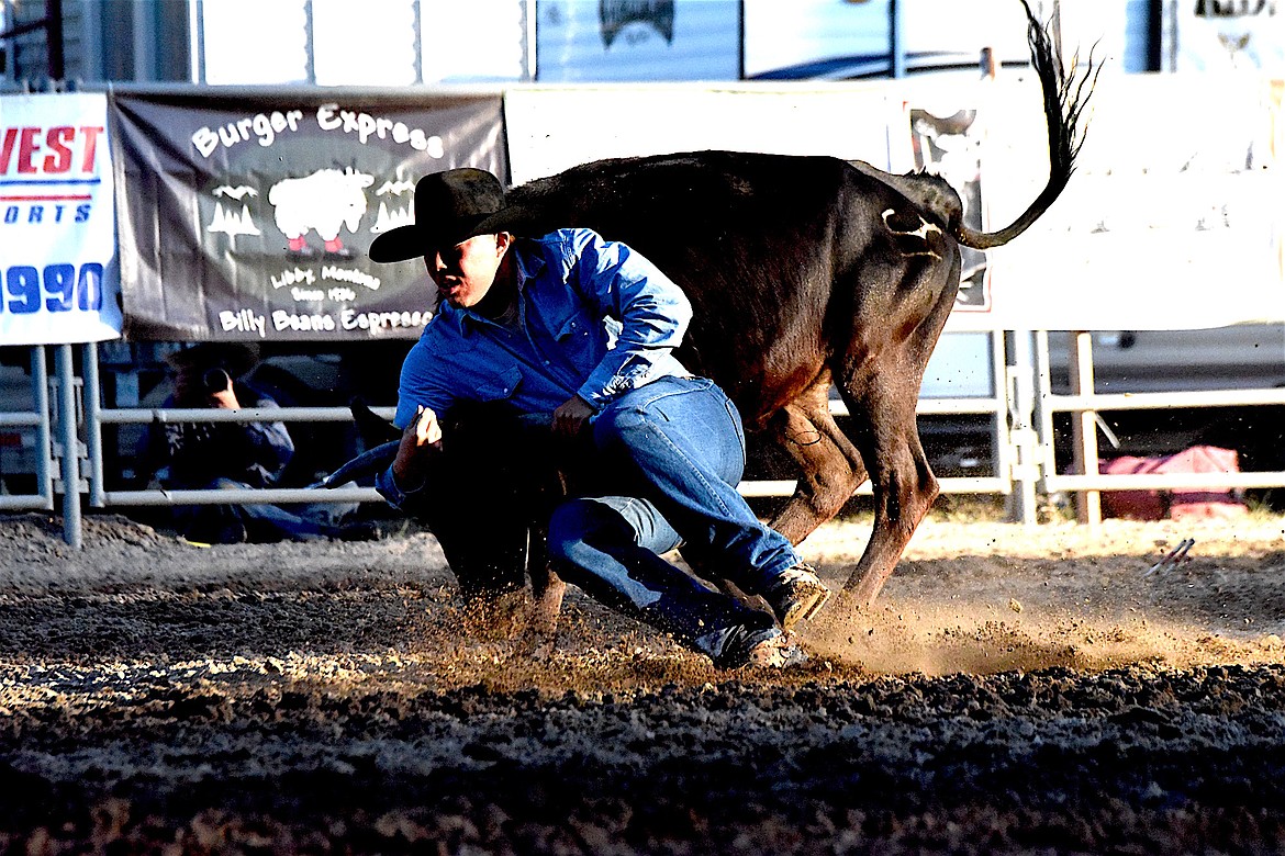 Great Falls' Cole Detton competed Saturday evening in the steer wrestling event at the Kootenai River Stampede. (Scott Shindledecker/The Western News)