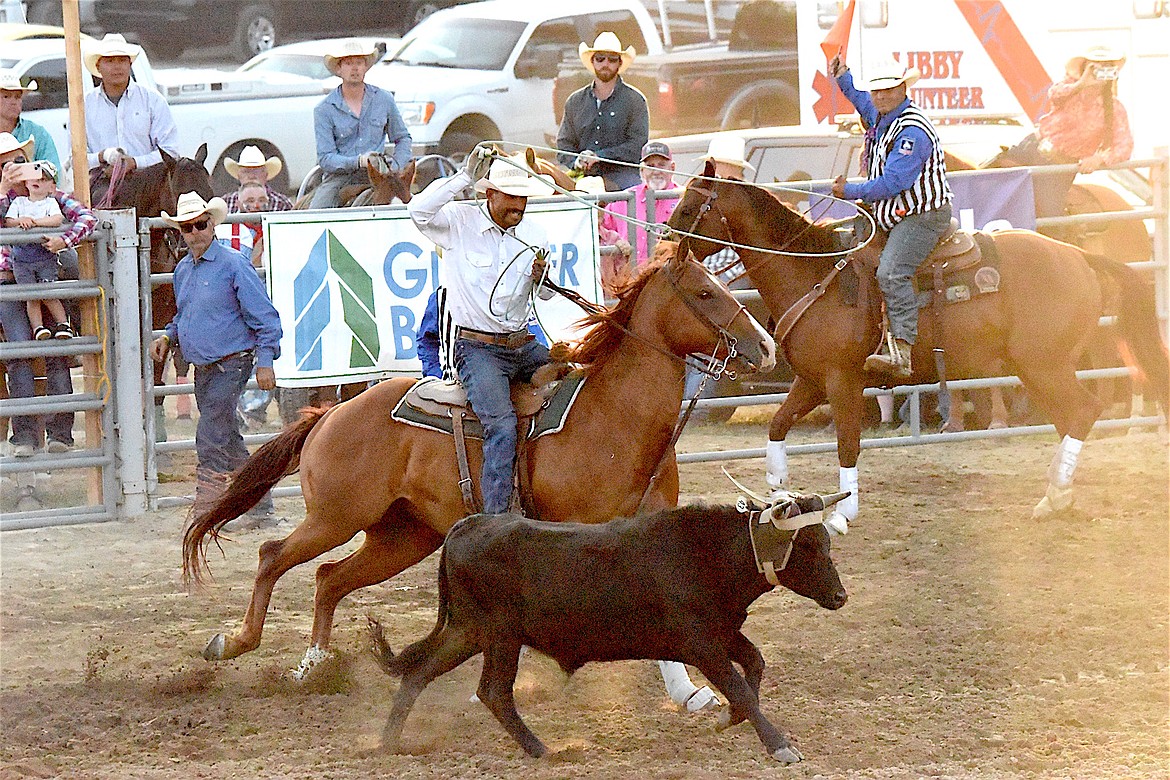 Dillon's Ian Austiguy competed Friday evening in the team roping event at the Kootenai River Stampede. (Scott Shindledecker/The Western News)