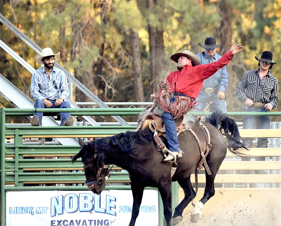 Libby's Jason Colclough rode "Miss Favorite" Saturday evening in the saddle bronc event at the Kootenai River Stampede. (Scott Shindledecker/The Western News)