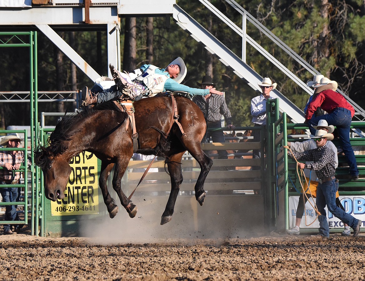 Bozeman's Nathaniel Dearhamer rode "My Pride" Saturday evening in the bareback riding event at the Kootenai River Stampede. (Scott Shindledecker/The Western News)